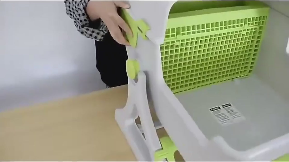 Demonstration of the OneRoll semi-automatic litter box: roll it over, the grill sifts the clumps into the pull-out tray, no motors involved