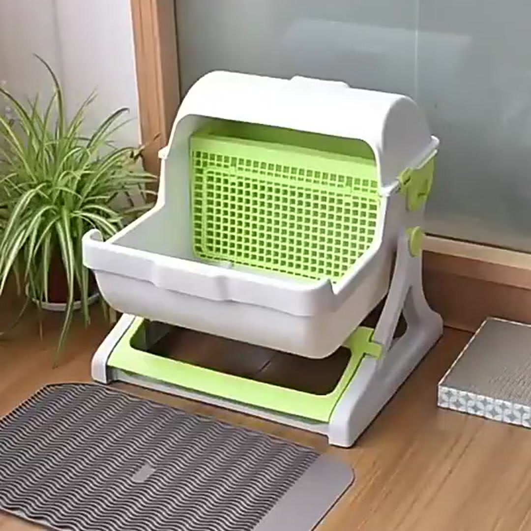 Furtopia OneRoll semi-automatic cat litter box set up in a bright home corner