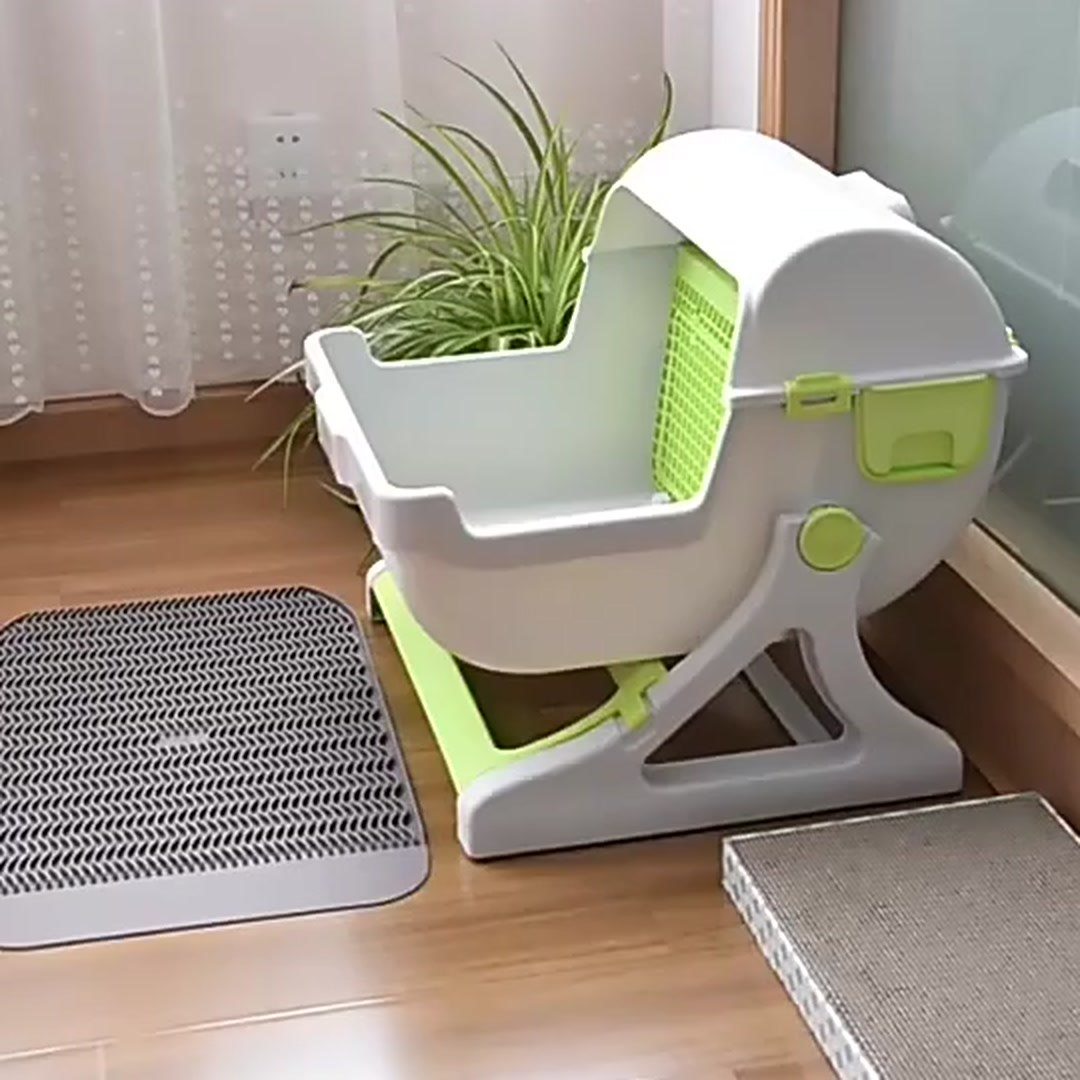 Side view of the OneRoll litter box showing the enclosed hood and sifting grill